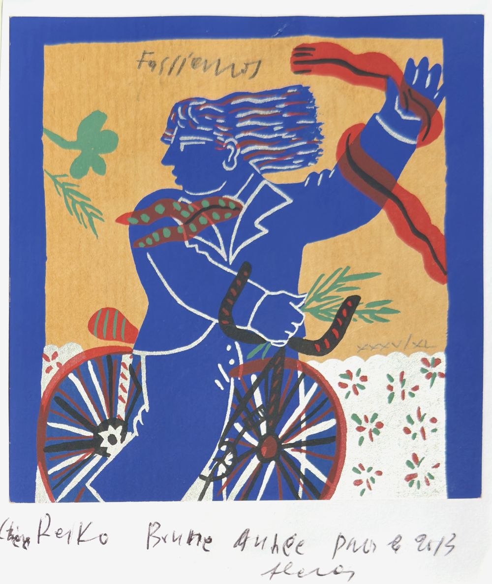 Cycliste à l'écharpe rouge